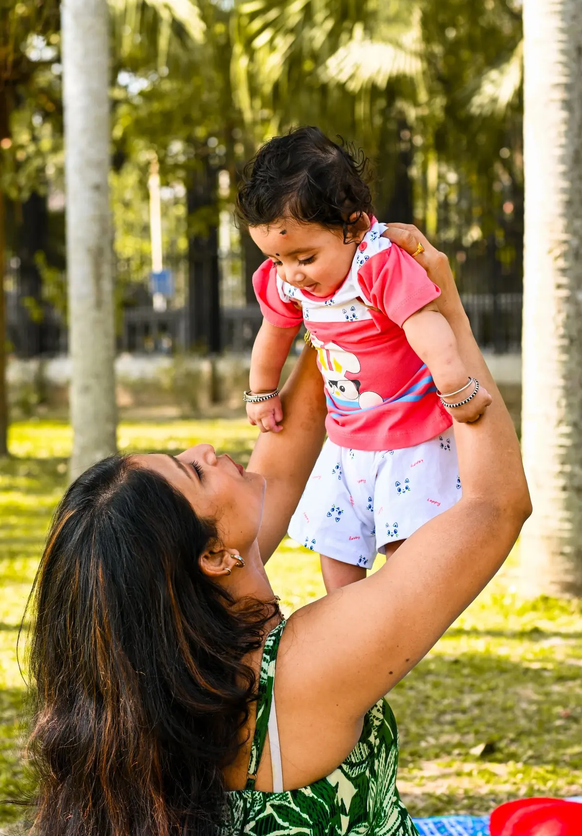 Mother Lifting Baby